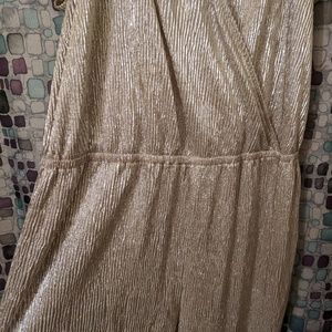 Xxl champagne jumpsuit. Never worn with tags